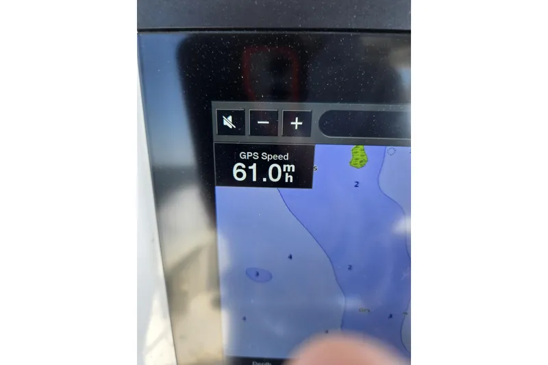 Slide: The Image of GPS display showing speed of 61 mph on 2021 Tidewater 320 CC Adventure. - 29