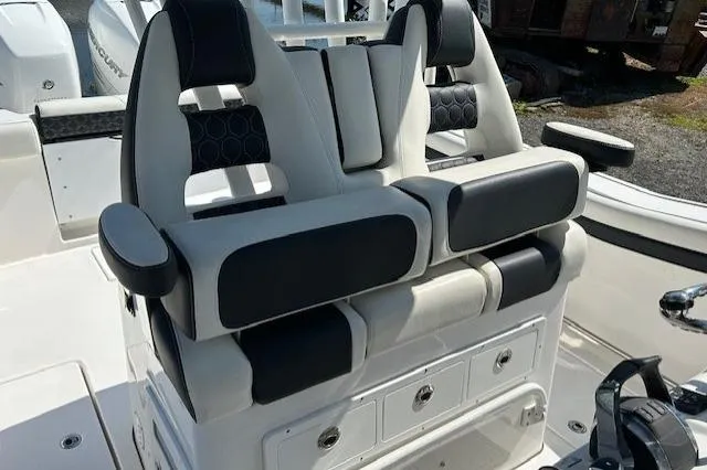 Slide: The Image of Control panel of 2021 Tidewater 320 CC Adventure boat with Garmin displays. - 5