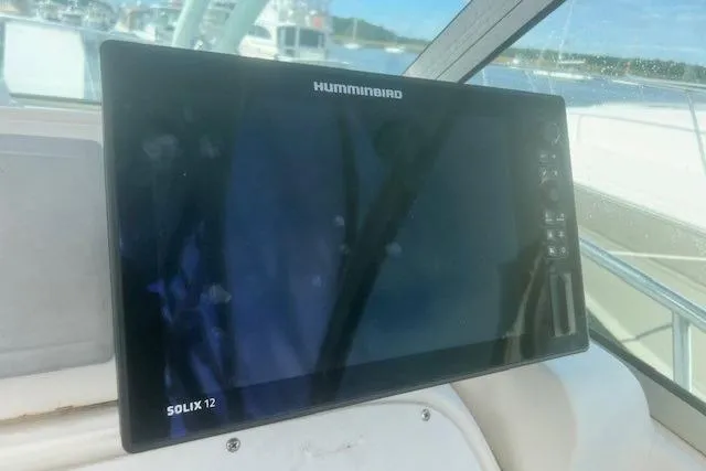 Slide: The Image of Humminbird Solix 12 fish finder on 2000 Wellcraft 2900 Coastal WA boat dashboard. - 6