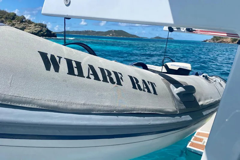 Slide: The Image of Inflatable boat "Wharf Rat" on clear blue water, Vision 444, 2021 model. - 17
