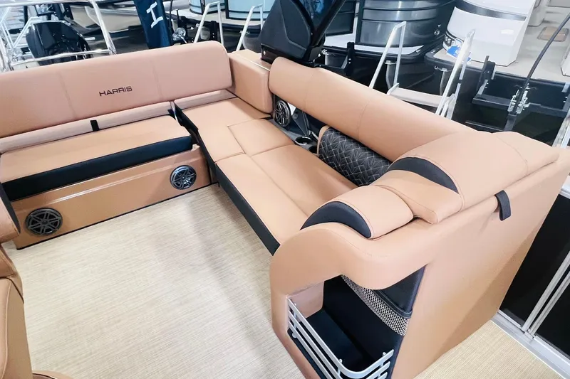 Slide: The Image of Luxurious seating on 2025 Harris 250 Grand Mariner V10 400 pontoon boat, featuring premium upholstery. - 12