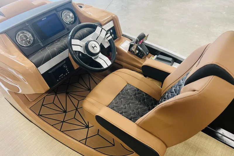 Slide: The Image of Luxurious interior of 2025 Harris 250 Grand Mariner V10 400 boat with modern dashboard. - 18