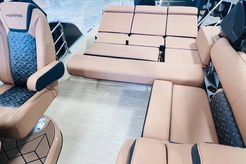 Slide: The Image of Luxurious interior of 2025 Harris 250 Grand Mariner V10 400 boat with plush seating. - 29