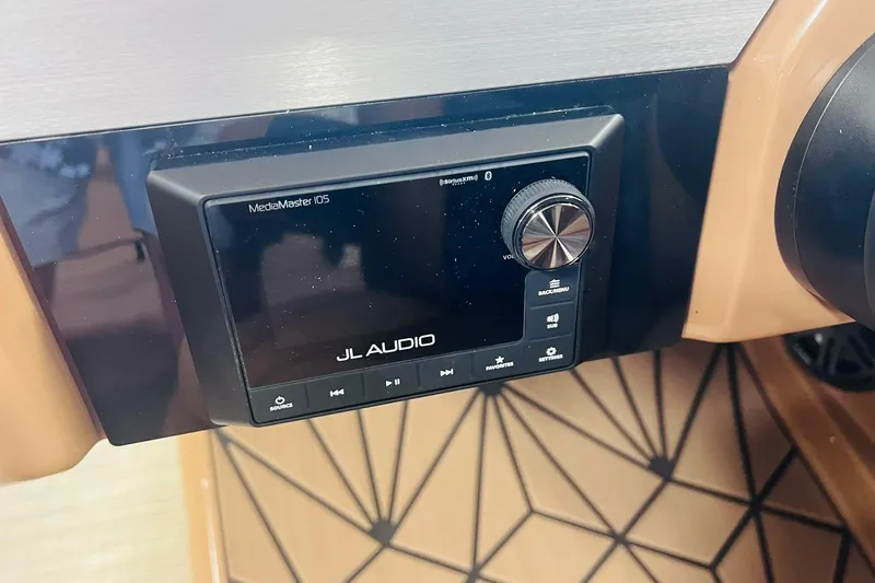 Slide: The Image of JL Audio MediaMaster 105 control panel in 2025 Harris 250 Grand Mariner V10 400 boat. - 37