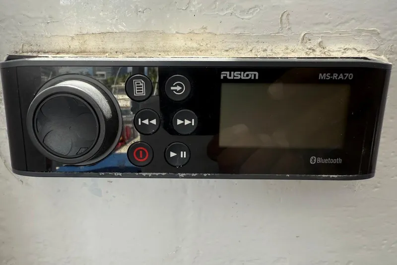 Slide: The Image of Fusion MS-RA70 Bluetooth stereo system on 2001 Force Power Cat boat. - 15