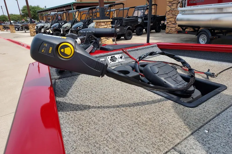 Slide: The Image of 2022 Tracker Pro Team 175 TXW boat with trolling motor and foot pedal controls. - 4