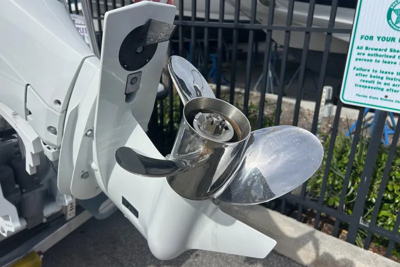 Slide: The Image of Close-up of a 2025 Piranha Magro P180 boat propeller, shiny and metallic. - 14