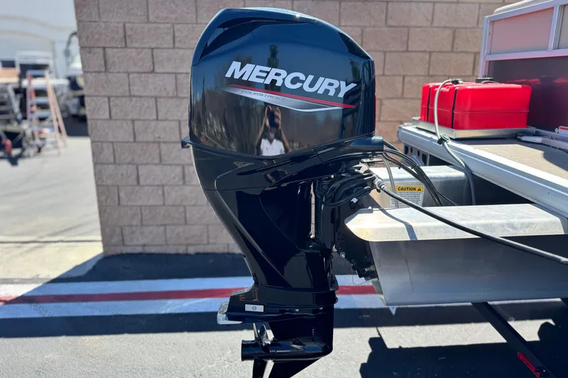 Slide: The Image of Outboard motor on 2025 Sun Tracker Party Barge 16 DLX pontoon boat. - 7
