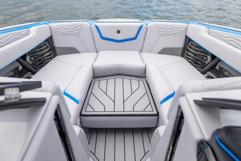 Slide: The Image of 2026 Nautique Super Air Nautique G23 boat interior with sleek seating and modern design. - 13