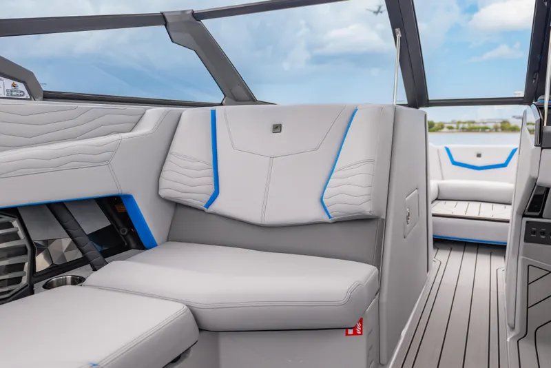 Slide: The Image of 2026 Nautique Super Air Nautique G23 interior with modern seating and sleek design. - 15