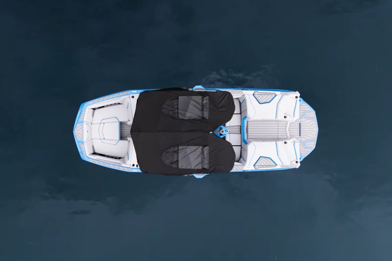 Slide: The Image of 2026 Nautique Super Air Nautique G23 boat, aerial view, on calm water. - 30