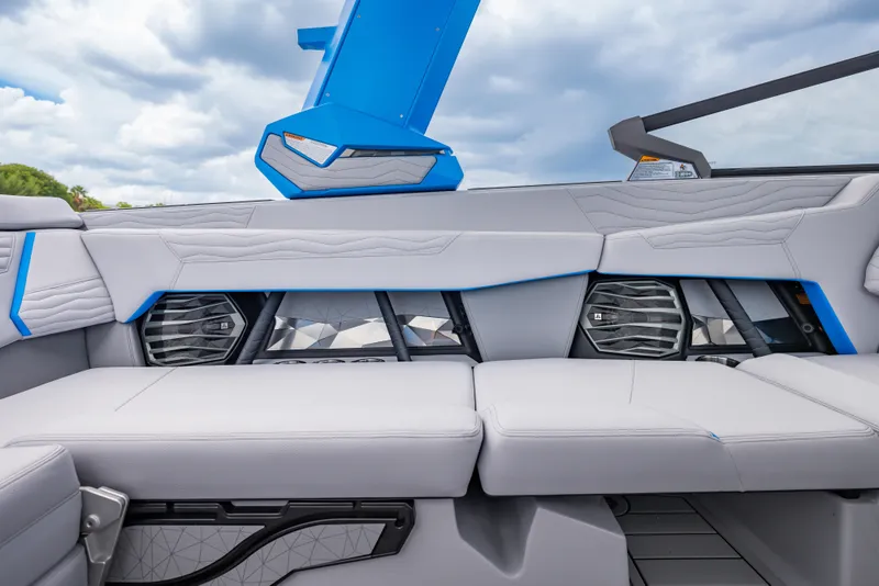 Slide: The Image of Interior of 2026 Nautique Super Air Nautique G23 boat with modern seating and speakers. - 6