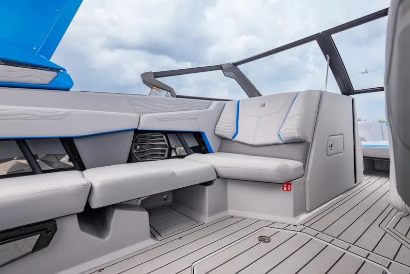 Slide: The Image of 2026 Nautique Super Air Nautique G23 interior with sleek seating and modern design. - 7