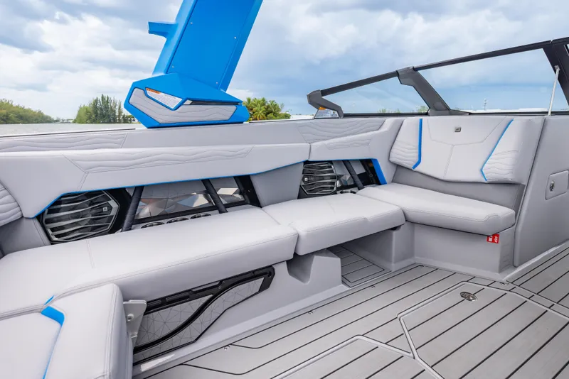 Slide: The Image of 2026 Nautique Super Air Nautique G23 interior with sleek seating and modern design. - 8