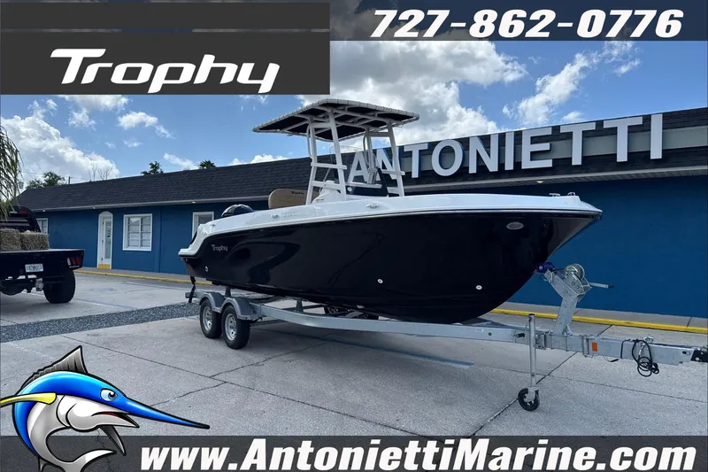 Slide: The Image of 2026 Trophy T22 Center Console boat on trailer at Antonietti Marine dealership. - 7