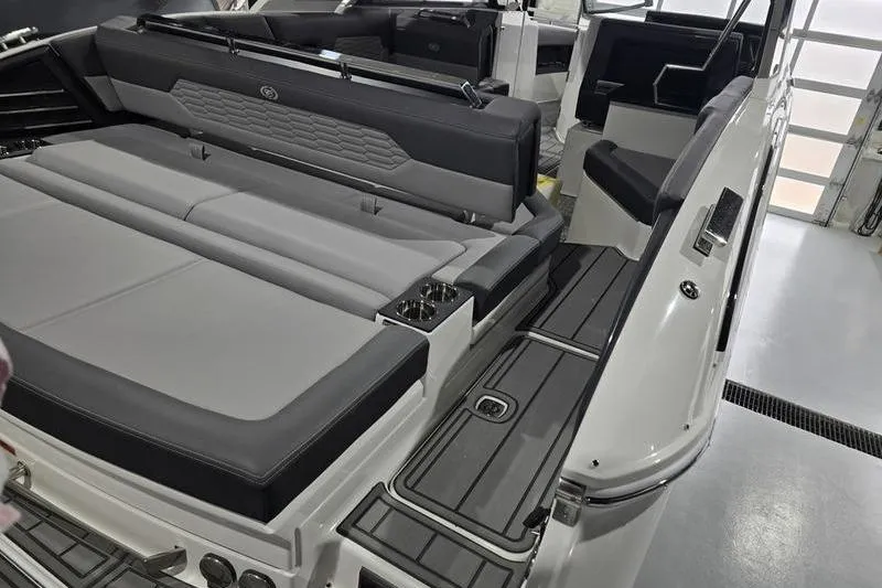 Slide: The Image of 2026 Cobalt A29 boat cockpit with modern steering wheel and control panel. - 13