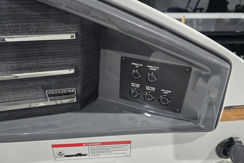 Slide: The Image of 2026 Cobalt A29 boat underside showing propeller and trailer details. - 14