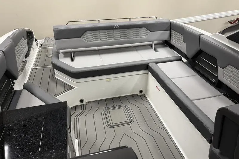 Slide: The Image of 2026 Cobalt A29 boat interior with gray seating and modern design. - 19