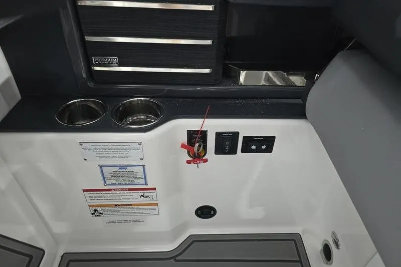 Slide: The Image of 2026 Cobalt A29 boat interior cabin with open door, showcasing sleek design and modern features. - 9