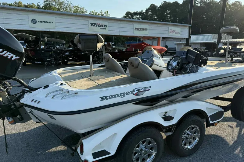 Slide: The Image of 2012 Ranger Z521 Comanche boat with Mercury engine at dealership. - 4