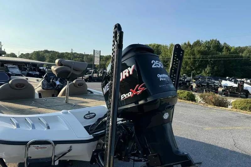 Slide: The Image of 2012 Ranger Z521 Comanche boat with Mercury Pro XS engine in outdoor setting. - 5