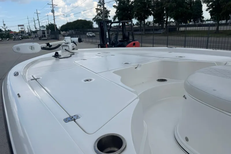 Slide: The Image of 2019 Epic E2 2100 Bay boat deck with seating and fishing equipment. - 19