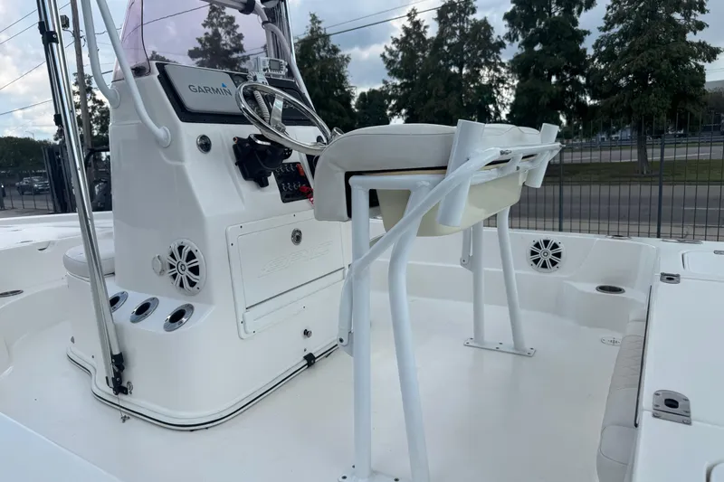 Slide: The Image of 2019 Epic E2 2100 Bay boat interior with Garmin system and seating. - 20