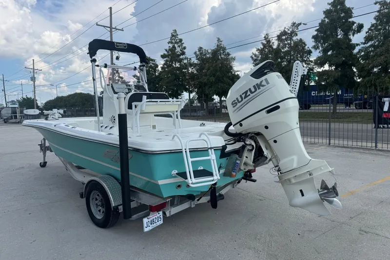 Slide: The Image of 2019 Epic E2 2100 Bay boat with Suzuki outboard motor on trailer. - 5