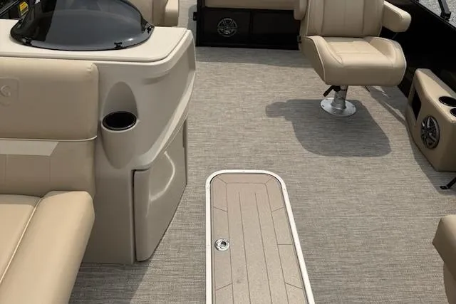 Slide: The Image of Interior of 2026 Godfrey Xperience EX2286SFLX pontoon boat with beige seating and flooring. - 5