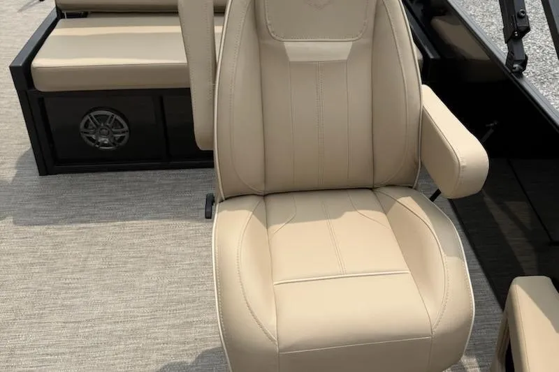 Slide: The Image of Beige captain's chair on 2026 Godfrey Xperience EX2286SFLX boat, featuring sleek design and comfort. - 9