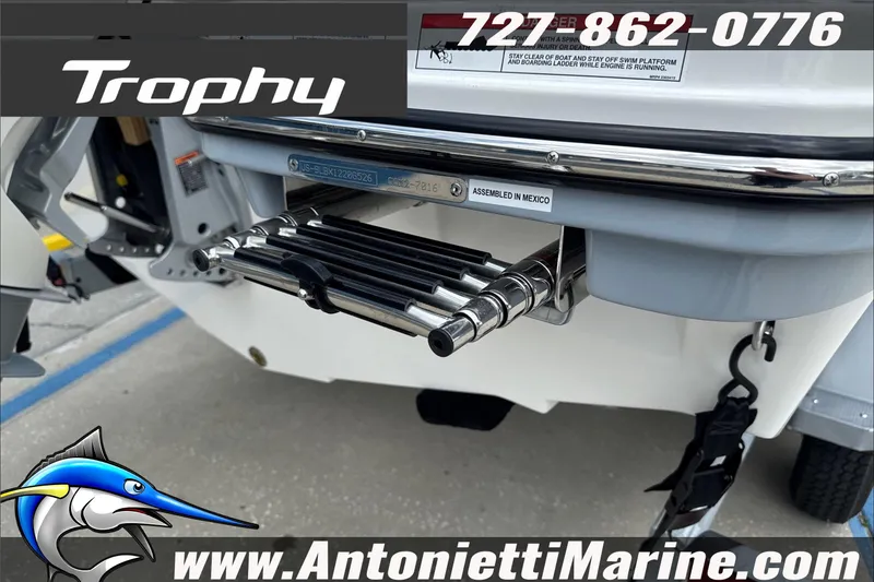 Slide: The Image of 2026 Trophy T22CC Center Console boat with swim platform ladder, assembled in Mexico. - 10