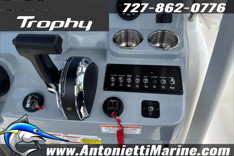 Slide: The Image of 2026 Trophy T22CC Center Console dashboard with controls and cup holders. - 20