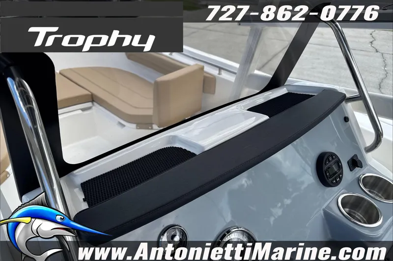 Slide: The Image of 2026 Trophy T22CC Center Console boat interior with seating and control panel. - 32