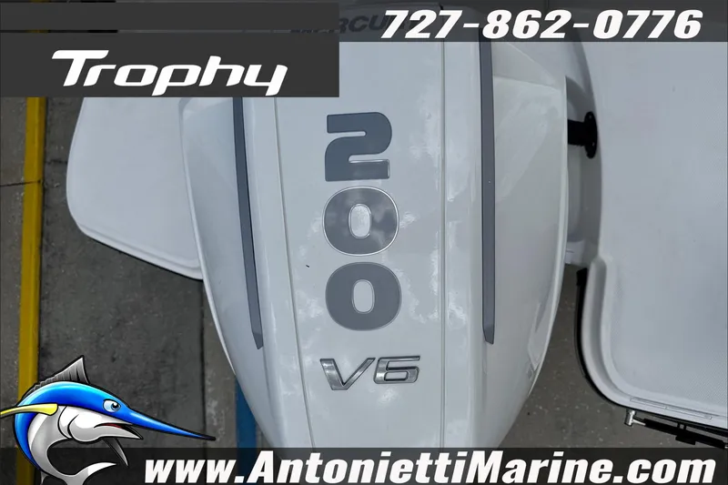 Slide: The Image of Trophy T22CC Center Console 2026 boat engine with V6 200 horsepower branding. - 33