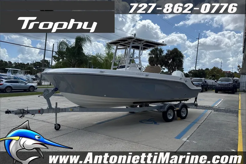 Slide: The Image of 2026 Trophy T22CC Center Console boat on trailer at Antonietti Marine dealership. - 6