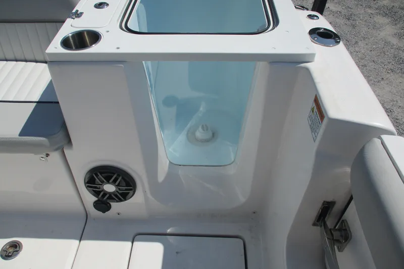 Slide: The Image of 2024 Sea Fox 268 Commander boat interior with livewell and speaker. - 11