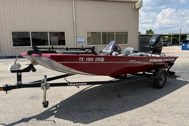 Slide: The Image of 2019 Tracker Pro 170 boat on trailer, parked outside a building. - 5