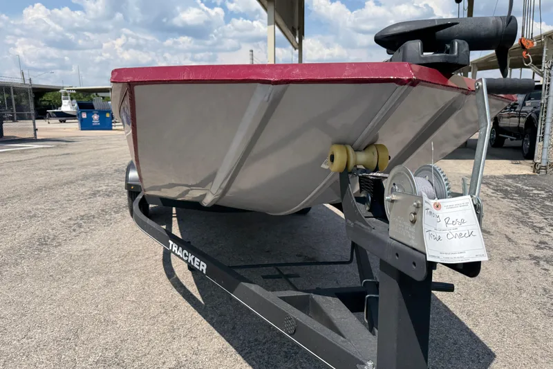 Slide: The Image of 2019 Tracker Pro 170 boat on trailer under sunny sky. - 7