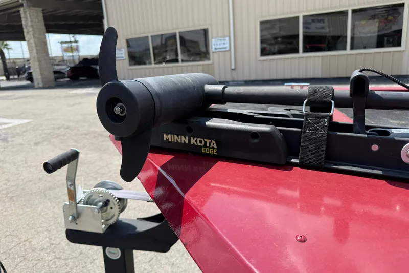 Slide: The Image of 2019 Tracker Pro 170 with Minn Kota Edge trolling motor on red boat. - 8