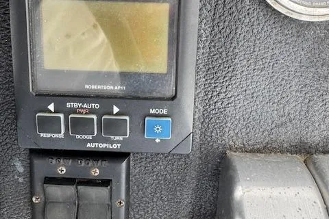 Slide: The Image of Autopilot control panel on a 1992 Mediterranean 38 Convertible boat. - 10