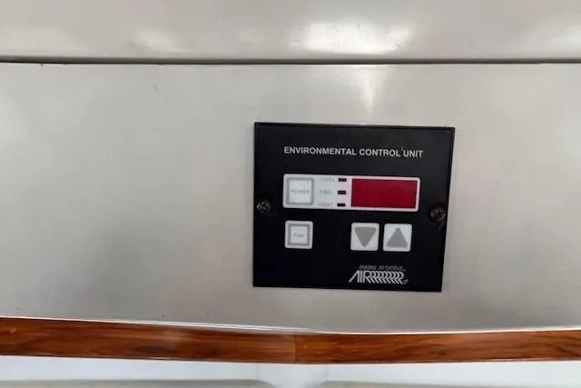 Slide: The Image of Environmental control unit on 1992 Mediterranean 38 Convertible yacht dashboard. - 28