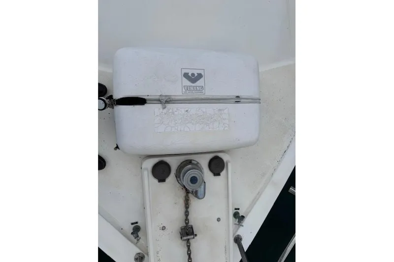 Slide: The Image of 1992 Mediterranean 38 Convertible boat deck with Viking equipment and anchor chain. - 32
