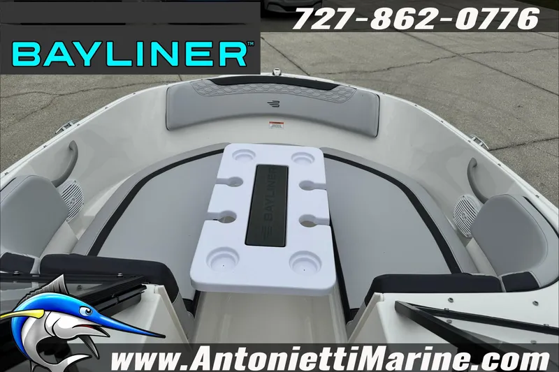 Slide: The Image of 2026 Bayliner Element E17 boat interior with seating and table, displayed by Antonietti Marine. - 26