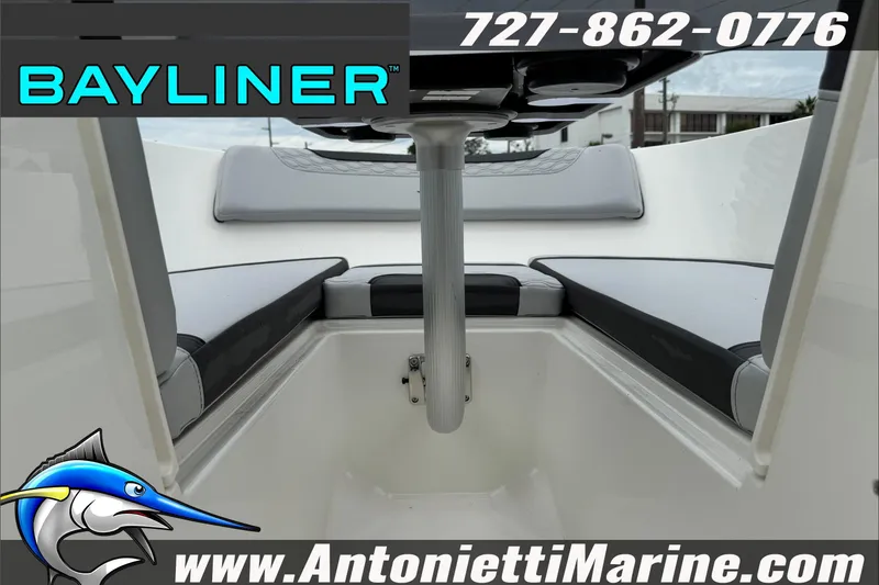 Slide: The Image of 2026 Bayliner Element E17 boat interior with seating and table, Antonietti Marine branding. - 27
