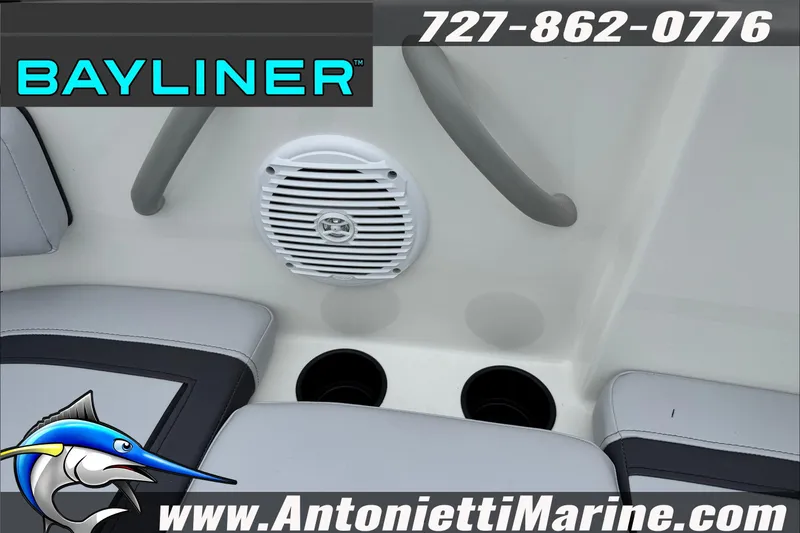 Slide: The Image of Bayliner Element E17 boat interior with speaker and cup holders, 2026 model. - 31