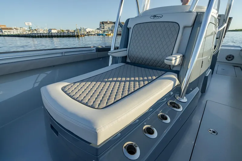 Slide: The Image of 2024 Valhalla Boatworks V-29 Hybrid with luxurious seating and sleek design on calm waters. - 15