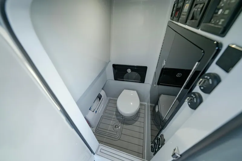 Slide: The Image of 2024 Valhalla Boatworks V-29 Hybrid interior bathroom with modern fixtures and sleek design. - 19