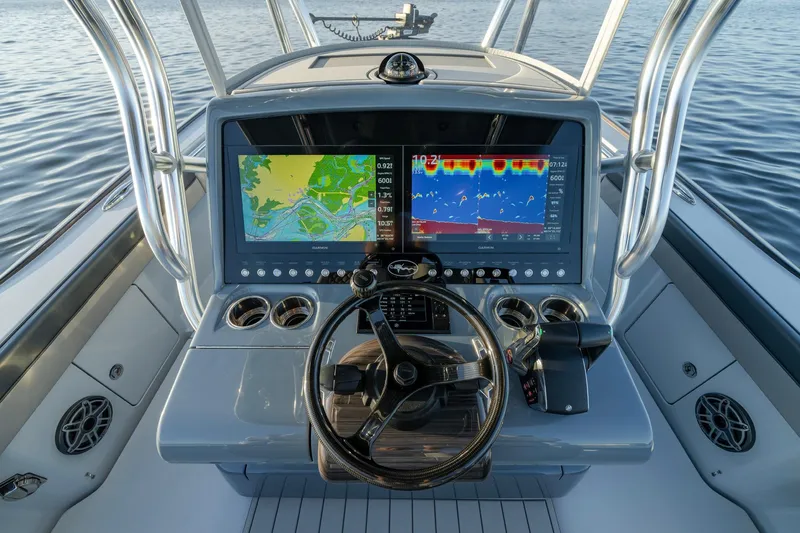 Slide: The Image of 2024 Valhalla Boatworks V-29 Hybrid dashboard with advanced navigation displays. - 21