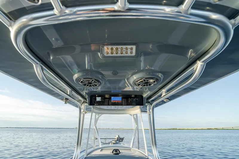 Slide: The Image of 2024 Valhalla Boatworks V-29 Hybrid helm with advanced electronics and sleek design. - 24
