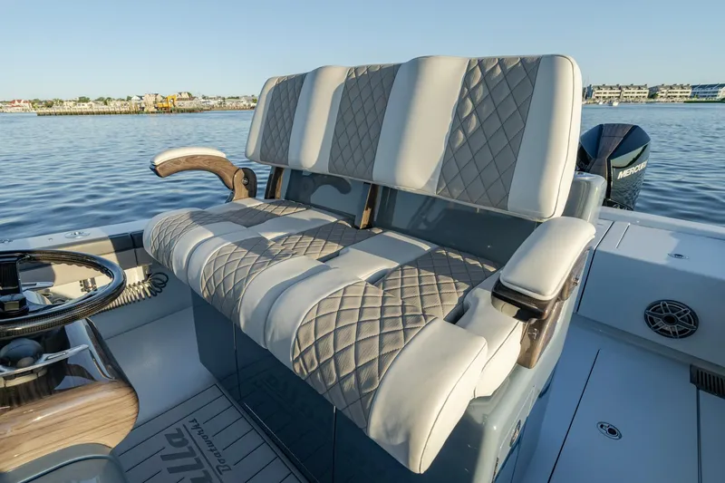 Slide: The Image of 2024 Valhalla Boatworks V-29 Hybrid interior with luxurious seating and steering wheel. - 26